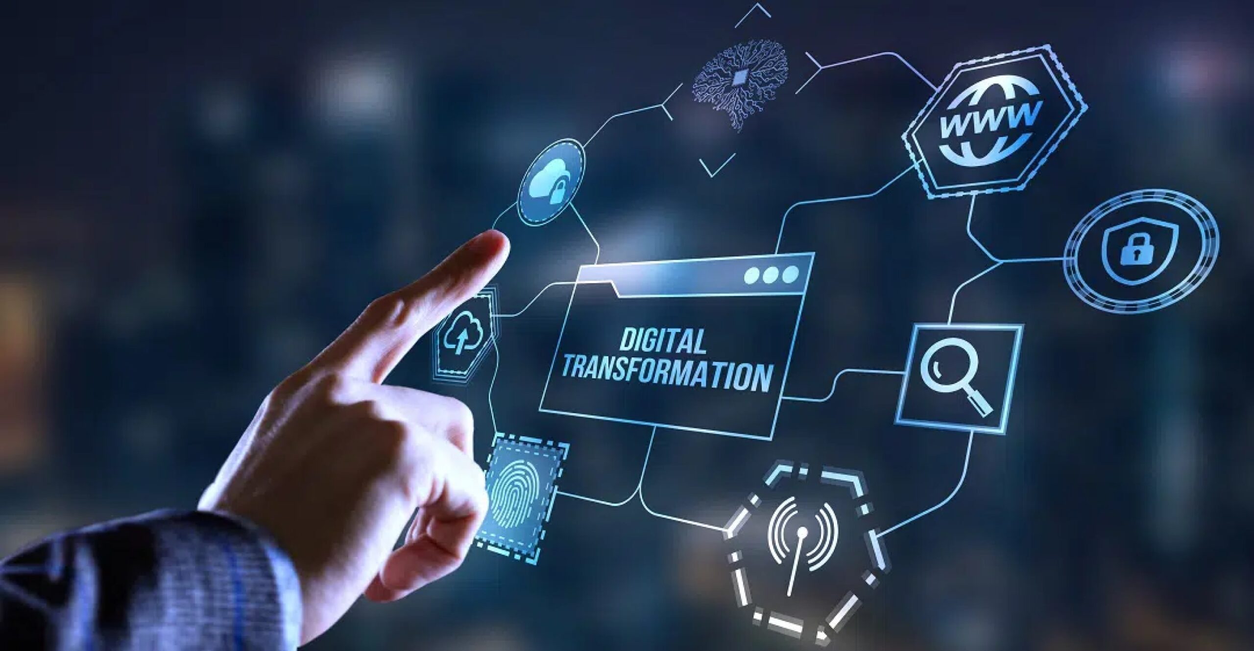Anklyticx - A man in a suit is pointing at a digital transformation icon.