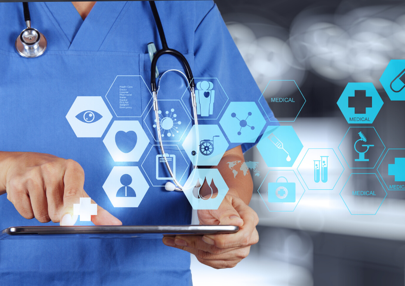Anklyticx - A nurse is holding a tablet with medical icons on it.
