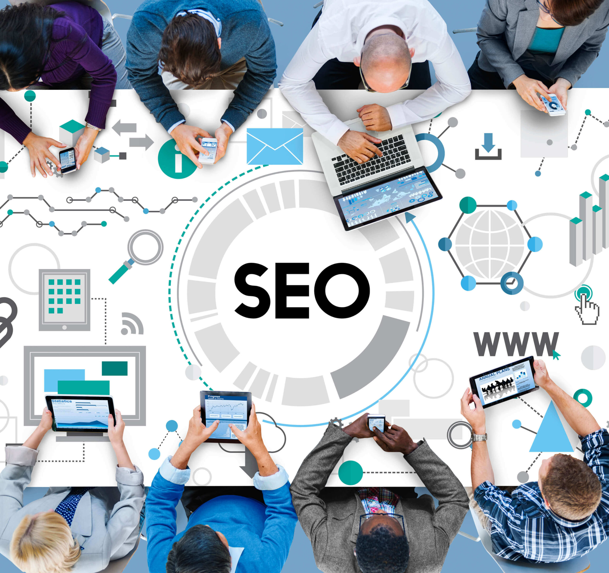 Anklyticx - A group of people sitting around a table with seo in the background.